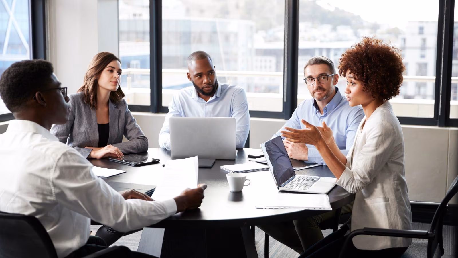 A team collaborating around digital product planning.